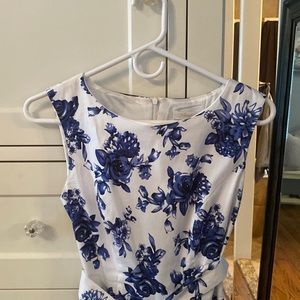 White dress with blue flowers